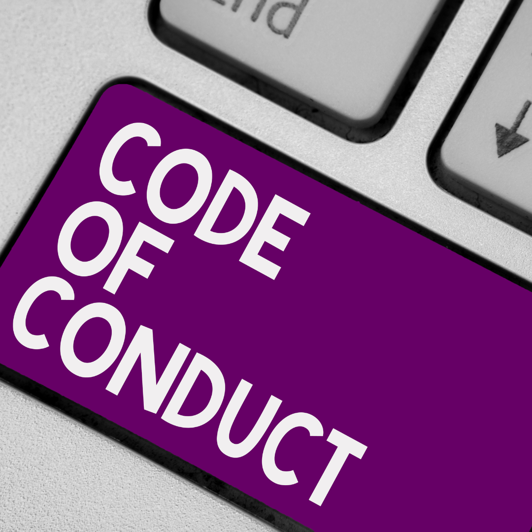 Computer key board with the words Code of Conduct labeled on one key in purple