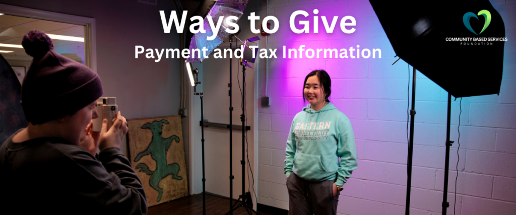 Ways to Give, Payment and Tax Information on a photo of a woman standing under photography lights that cast purple and turquoise glow while another women wearing a hat with pompom takes a photo.