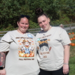 Staff at Cultivating Dreams day program pose together outdoors and wear fun fall tee graphic tee shirts