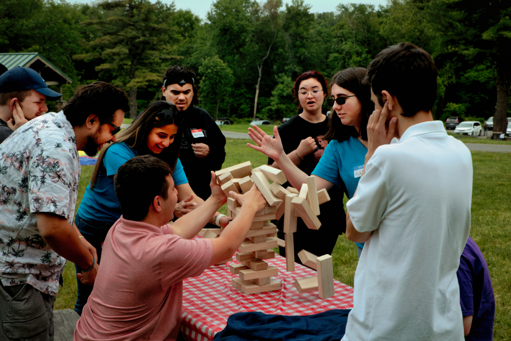 Group of people playing Jenga
